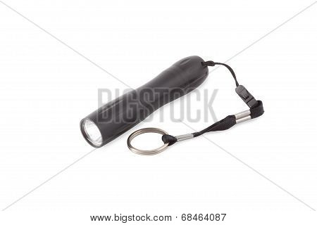 Black pocket flashlight.