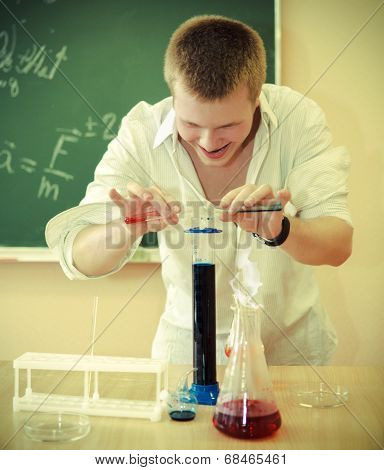 Crazy Scientist At Laboratory On Chemical Experiment