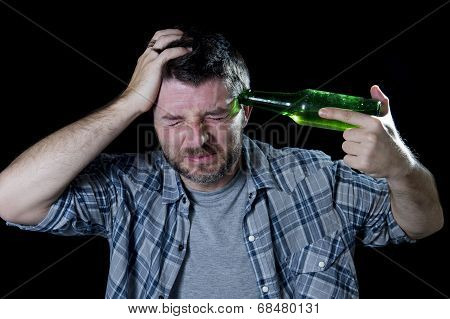 Crazy Man Holding Beer Bottle As A Gun With Handgun Pointing To His Head