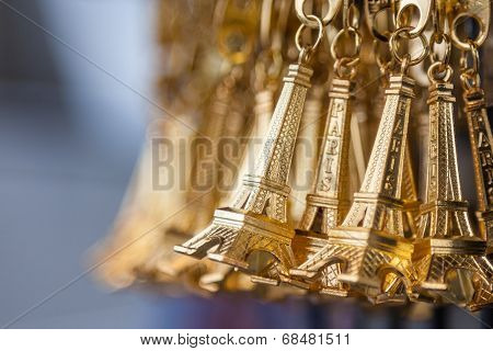 Small Gold Eiffel Tower Key Chain In A Souvenir Shop