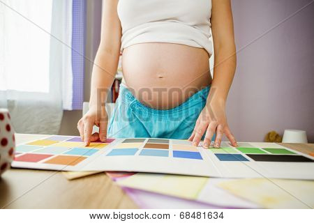 Pregnant woman working from home