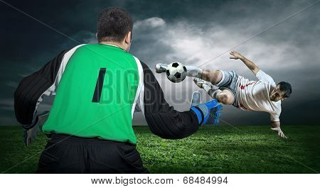 Two Football players in action outdoors