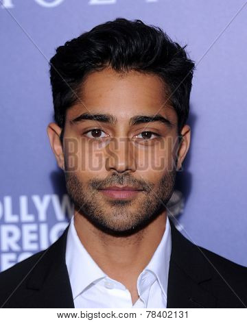 LOS ANGELES - AUG 14:  Manish Dayal arrives to the HFPA Annual Installation Dinner 2014 on August 14, 2014 in Beverly Hills, CA                
