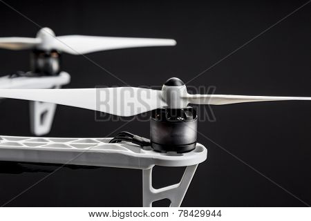 propellers of a hexacopter drone against black background