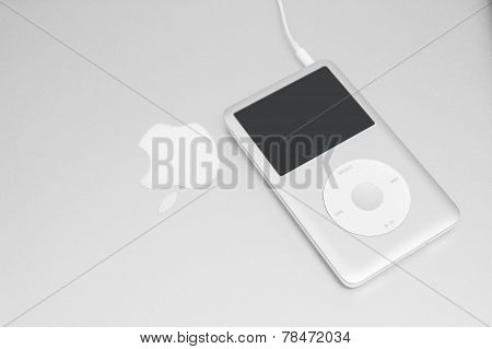Ipod Classic 160 Gb On Silver Macbook. Studio Shot.