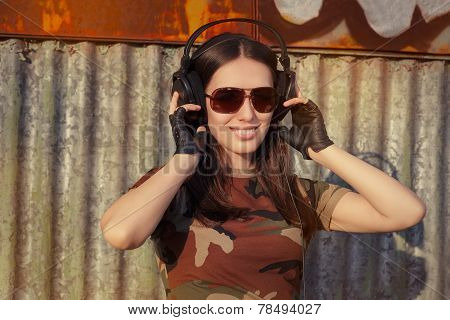 Young Woman with Big Headphone in Army Camouflage T-shirt