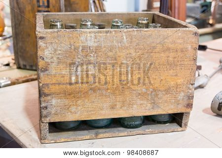 Empty Bottles In Vintage Wodden Crate