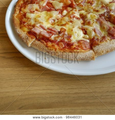Delicious Hawaiian Rustic Style Pizza Made With Fresh Pineapples,ham And Mozzarella Cheese