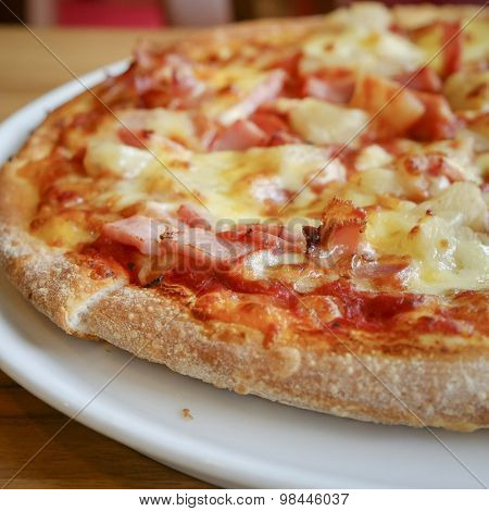 Delicious Hawaiian Rustic Style Pizza Made With Fresh Pineapples,ham And Mozzarella Cheese