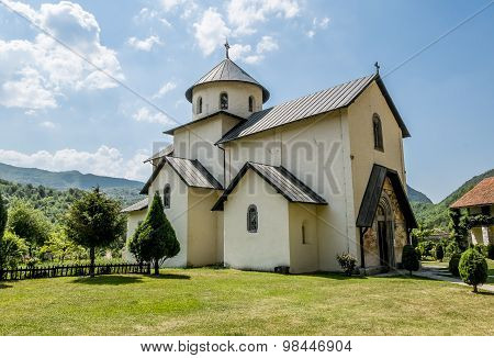 Monastery On The River Moraca Amid Mountains In The Background. Montenegro