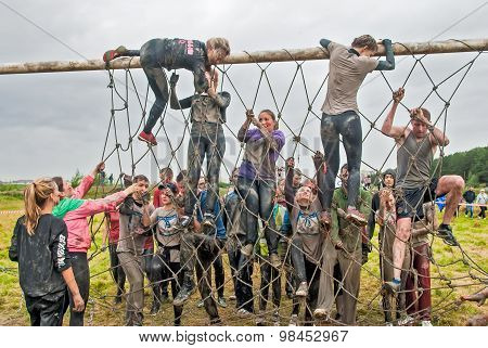 Team storms net wall in extrim race. Tyumen.Russia