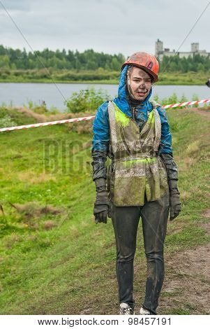 Attractive girl in extrime racing waits own team