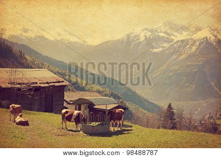Small farm in Swiss alps.  Bodmen, Valais, Switzerland. Added paper texture

