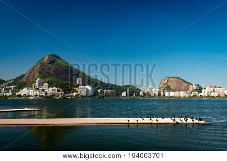 View or Mountains and Buildings of Rio de Janeiro around Rodrigo de Freitas Lagoon