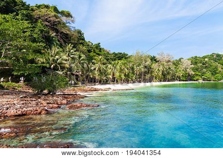 Shore of a tropical island with perfectly clean water