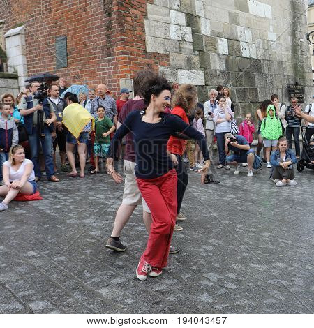 CRACOW POLAND - JULY 5 2017: 30th Street - International Festival of Street Theaters in Cracow Poland. An Odyssey Towards New Shores - a street parade