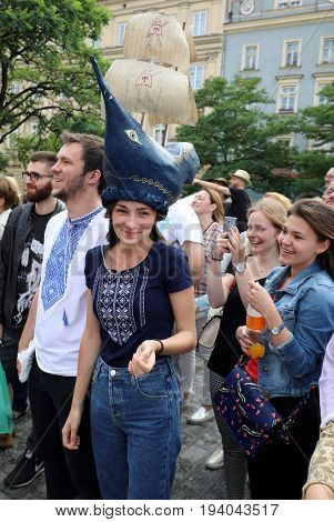 CRACOW POLAND - JULY 5 2017: 30th Street - International Festival of Street Theaters in Cracow Poland. An Odyssey Towards New Shores - a street parade