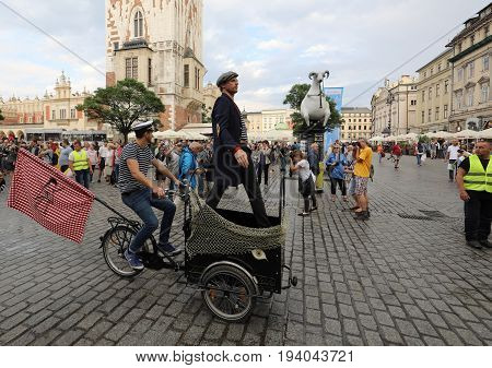CRACOW POLAND - JULY 5 2017: 30th Street - International Festival of Street Theaters in Cracow Poland. An Odyssey Towards New Shores - a street parade