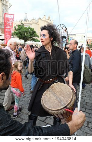 CRACOW POLAND - JULY 5 2017: 30th Street - International Festival of Street Theaters in Cracow Poland. An Odyssey Towards New Shores - a street parade