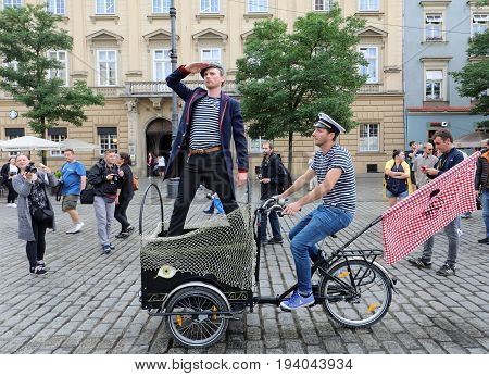 CRACOW POLAND - JULY 5 2017: 30th Street - International Festival of Street Theaters in Cracow Poland. An Odyssey Towards New Shores - a street parade