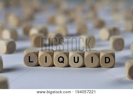 Liquid - Cube With Letters, Sign With Wooden Cubes