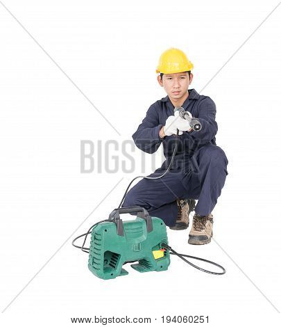Young Man Sitting And Holding High Pressure Water Gun