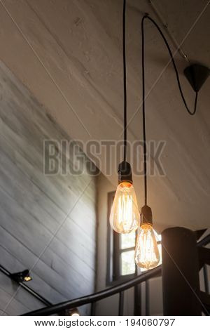 Vintage bulbs on wall background stock photo