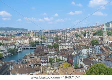 Top view of the beautiful old city with red-tiled roofs