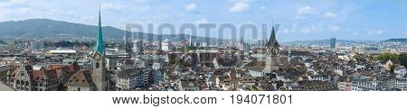Top view of the beautiful old city with red-tiled roofs and spires panoramic