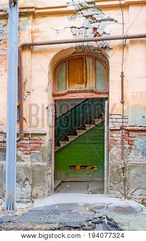 The Front Door Of Ramshackle House In Tbilisi