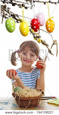 a little girl with easter eggs close up