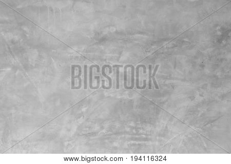 close up surface detail of abstract raw concrete wall texture background grey (gray) solid cement backdrop or wallpaper from architecture and construction material design element for display product