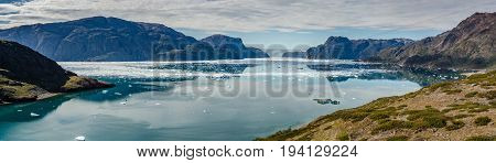 Small icebergs and reflections near a glacier Greenland