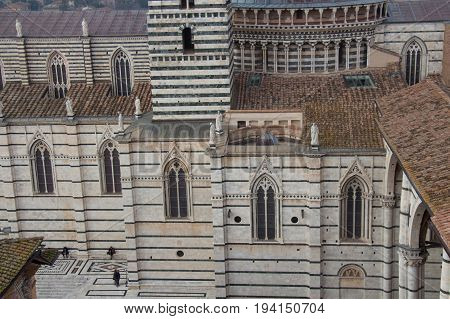 Italy Siena - December 26 2016: the detailed view from facciatone of Duomo di Siena or Metropolitan Cathedral of Santa Maria Assunta on December 26 2016 in Siena Tuscany Italy.