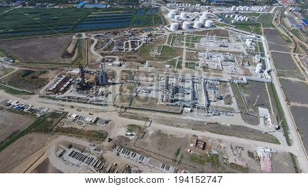 Oil Refinery Plant For Primary And Deep Oil Refining. Equipment And Tanks In The Oil Refinery. Recti