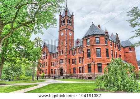 Gettysburg USA - May 24 2017: Glatfelter Hall Gettysburg College red brick building with cloudy sky and clock