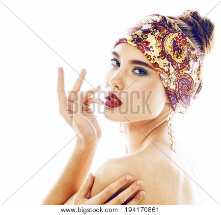 young pretty modern girl with bright shawl on head emotional posing isolated on white background, asian people ethnicity