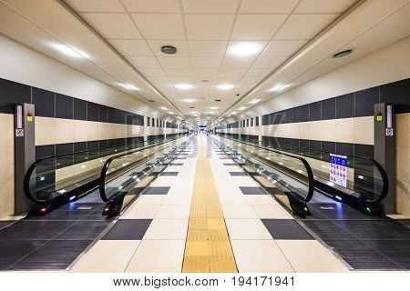 BARI ITALY - JULY 09 2015: Moving escalator conveyor at Karol Wojtyla Airport in Bari.