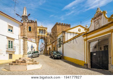 ELVAS,PORTUGAL - MAY 16,2017 - Pillory and Arch of Santa Clara in Elvas city . Elvas is a Portuguese municipality former episcopal city and frontier fortress of easternmost central Portugal.