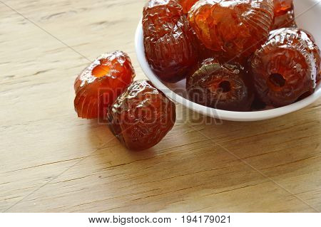 Chinese jujube candy coating syrup on little cup