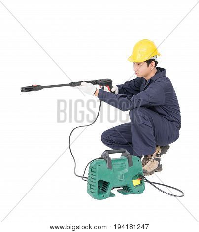 Young Man Sitting And Holding High Pressure Water Gun