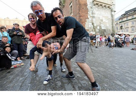 CRACOW POLAND - JULY 5 2017: 30th Street - International Festival of Street Theaters in Cracow Poland. An Odyssey Towards New Shores - a street parade