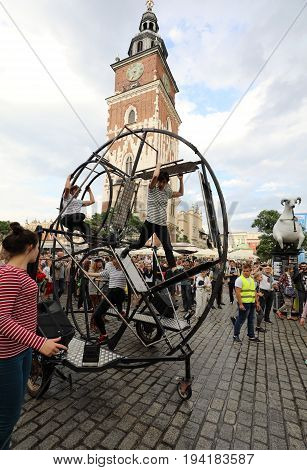 CRACOW POLAND - JULY 5 2017: 30th Street - International Festival of Street Theaters in Cracow Poland. An Odyssey Towards New Shores - a street parade