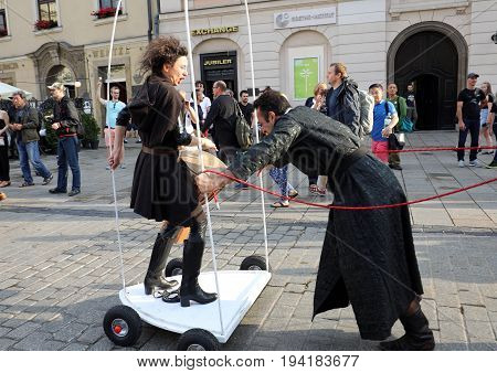 CRACOW POLAND - JULY 5 2017: 30th Street - International Festival of Street Theaters in Cracow Poland. An Odyssey Towards New Shores - a street parade