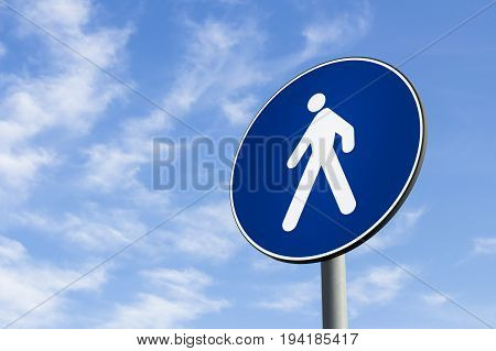 Pedestrian lane road sign on blue sky background
