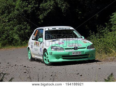 La Spezia Italia - July 2 2017 -Rally Gulf of Poets: The Peugeot 106 rally Bertagna-Ulivi crew during the first special race race test.