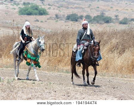 Tiberias Israel July 01 2017 : Participants in the reconstruction of Horns of Hattin battle in 1187 left the camp on horseback and ride go to the battle site near TIberias Israel