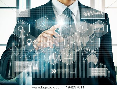 Close up of male hand pointing at abstract business projection. Bright interior in the background. User technology and network concept. Double exposure