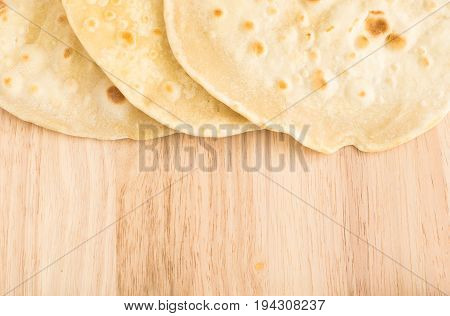 Flat Bread On A Wooden Background