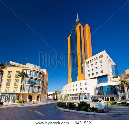 Stunning image of the city San Giljan and Portomaso business tower. Location place Malta island, Europe. Gorgeous day and picturesque scene. Popular tourist attraction. Beauty world. 